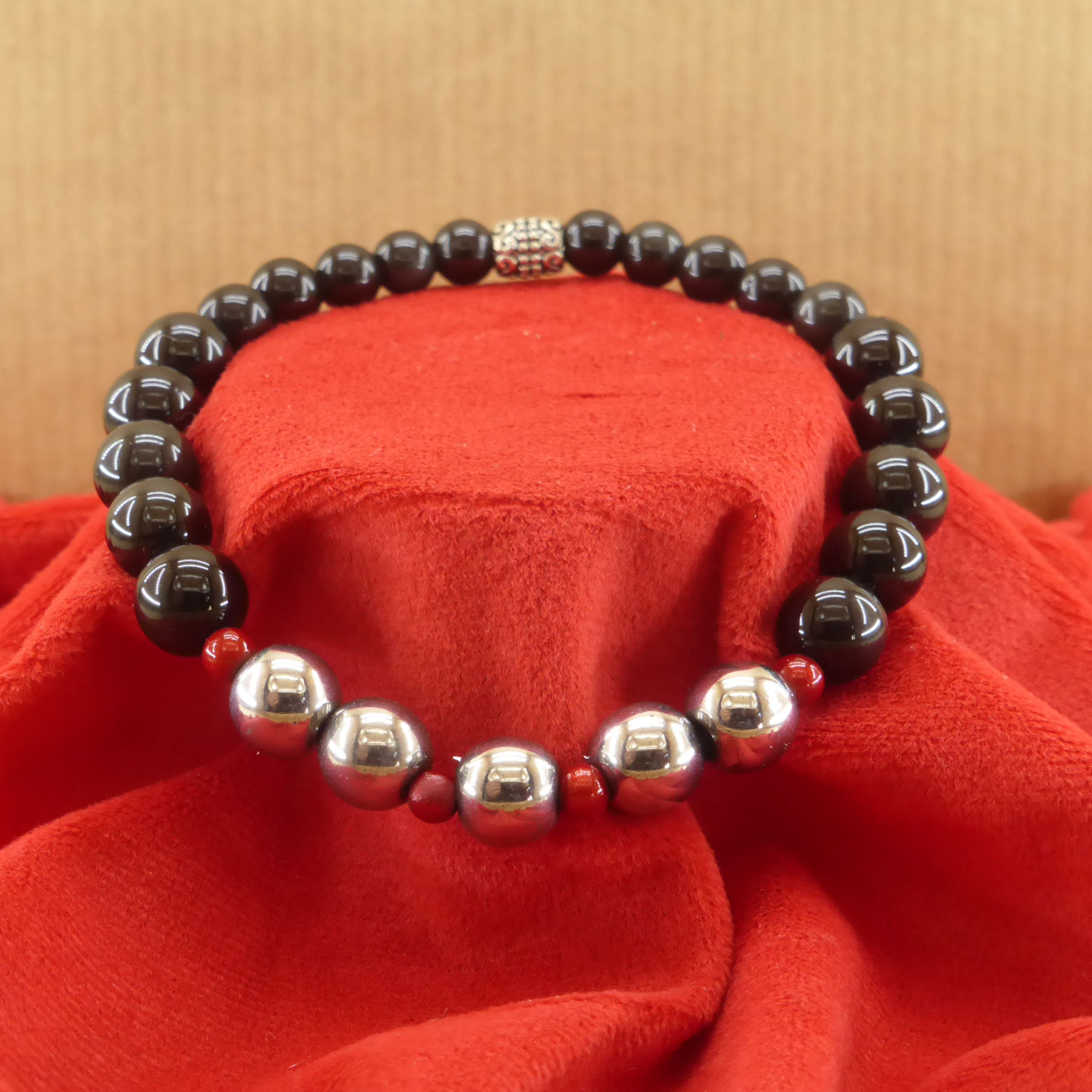 Metal beads and black onyx bracelet