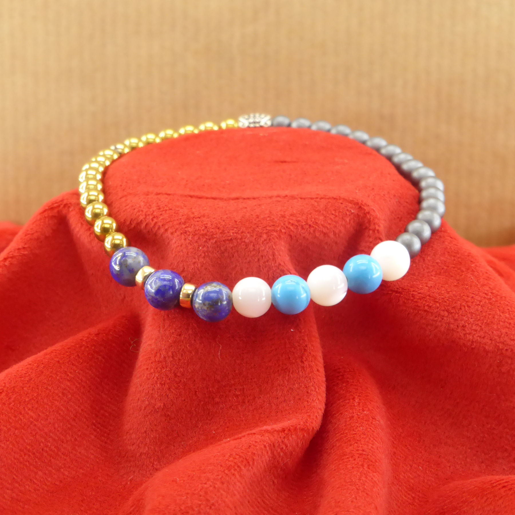 Lapis Lazuli bracelet, turquoise and mother-of-pearl on matt gray and gold hematite