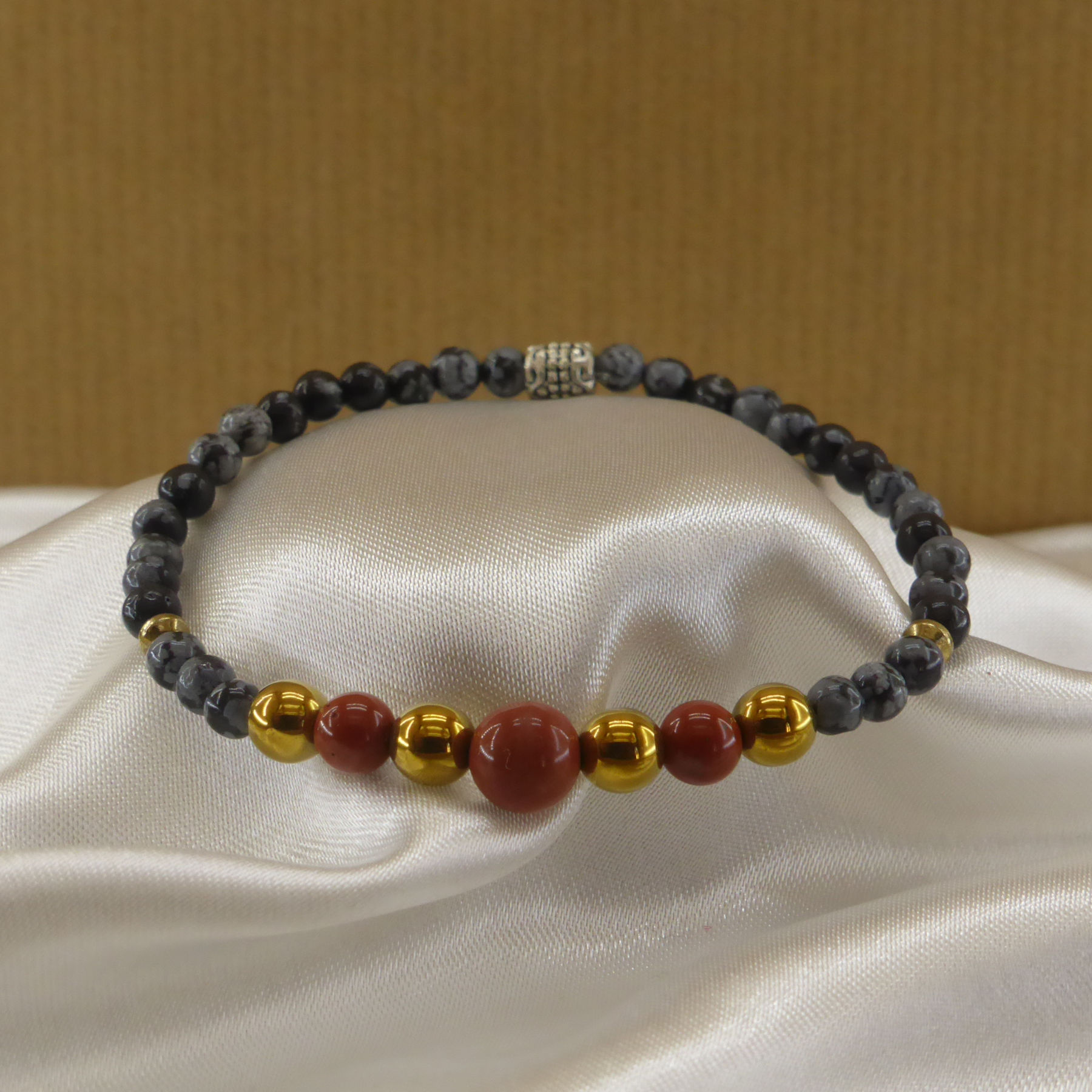 Red Jasper and Gold Hematite Bracelet on Snowflake Obsidian
