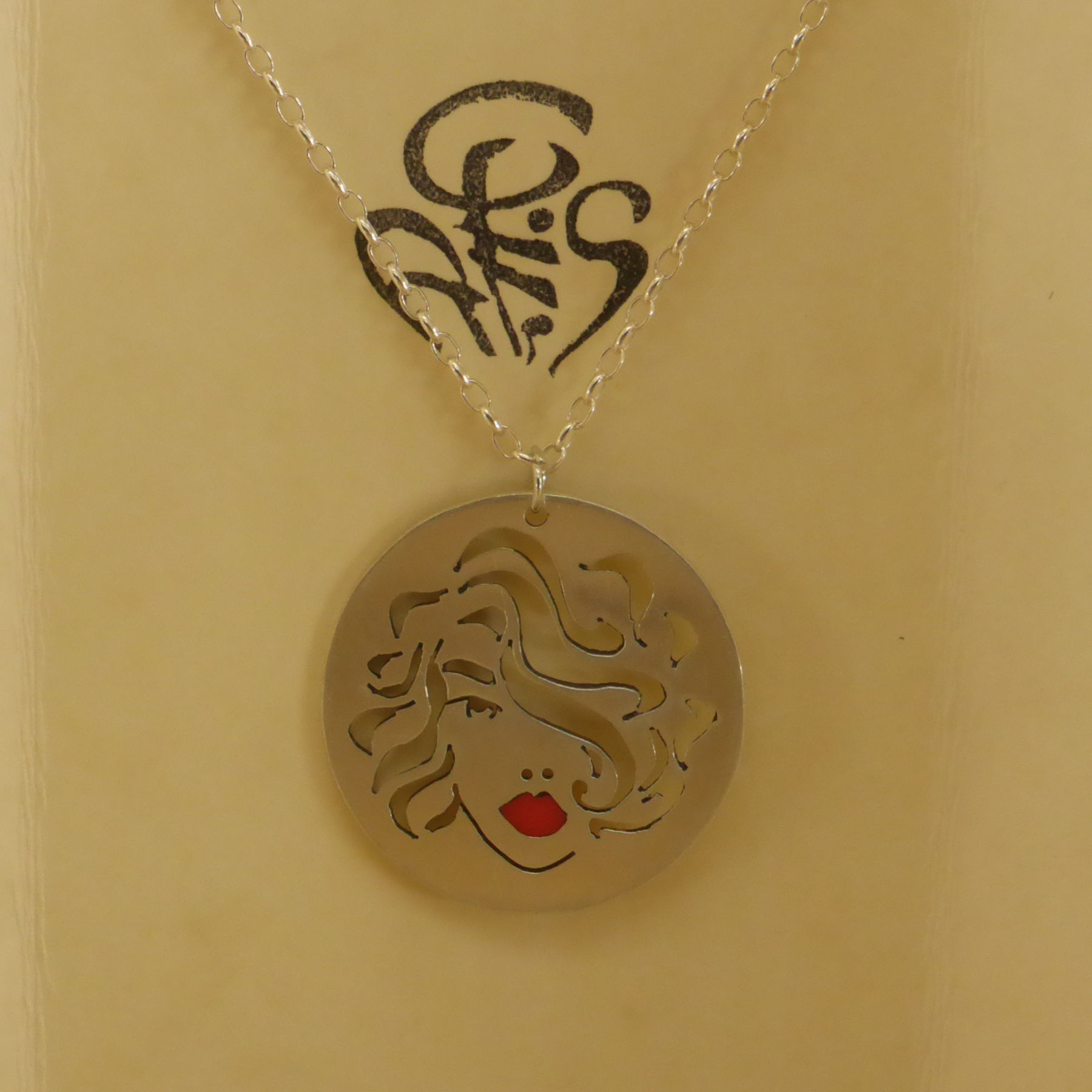 Sterling silver medallion face collection pendant