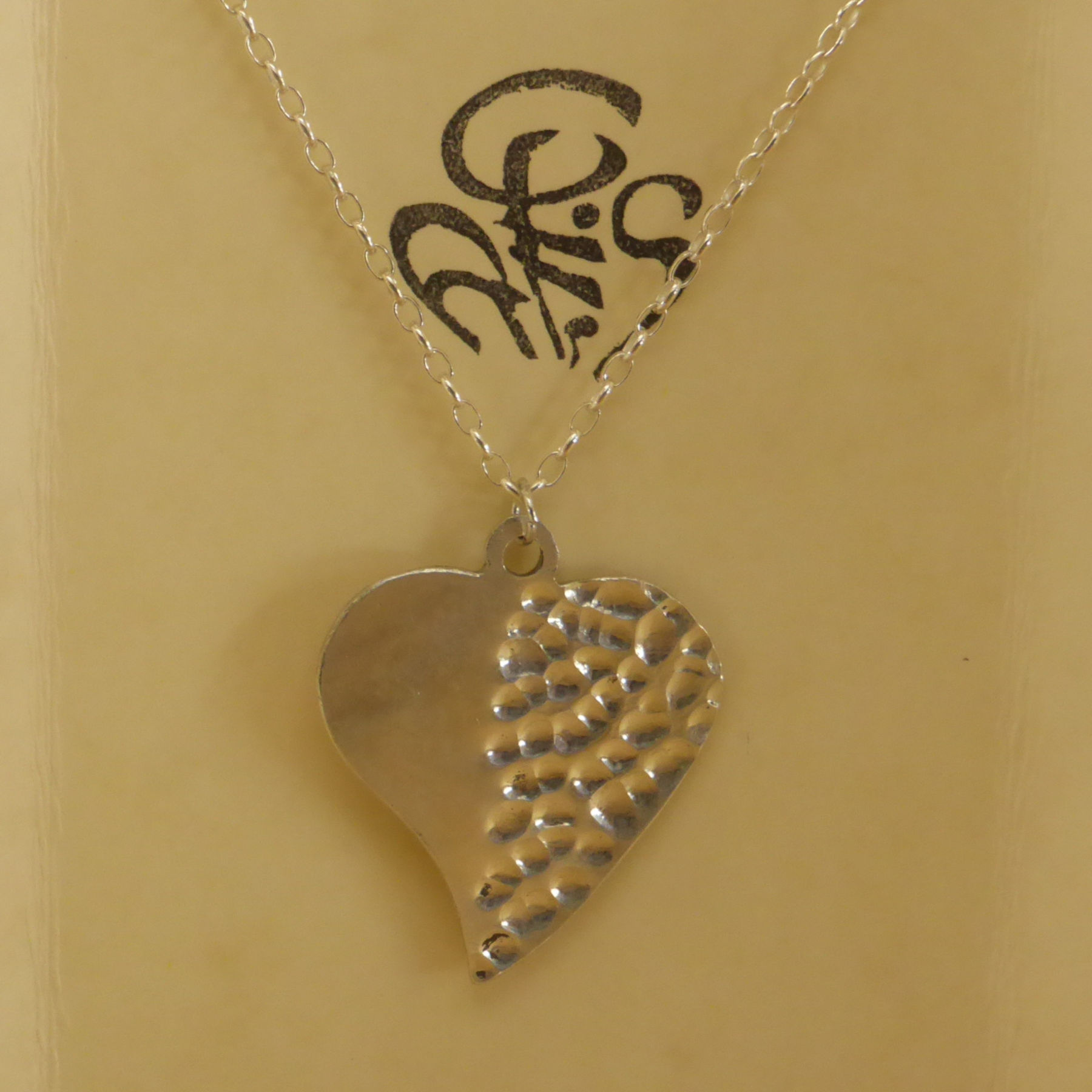 Solid silver heart pendant